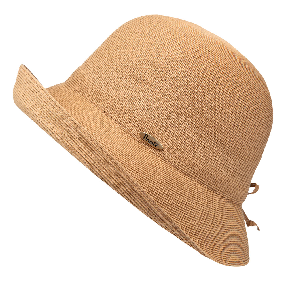 Bronté Zoey is a cloche sun hat made of natural super braided straw, in a camel color, rollable hat
